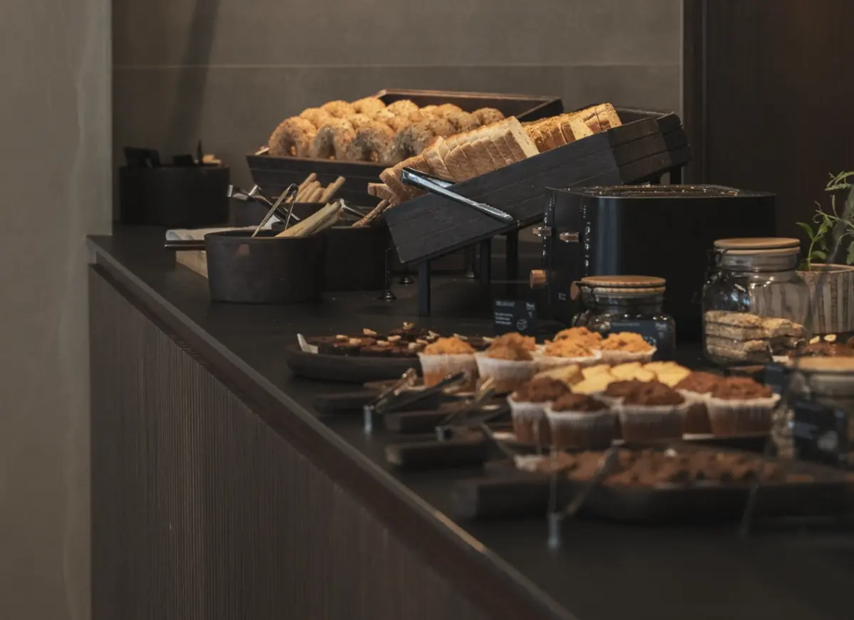 Bakery station with bagels, toast bread, muffins and a toaster